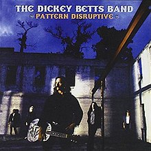 The Dickey Betts Band, outside a building in dark light