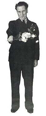 Max Ehrlich on Stage with Bouquet.jpg