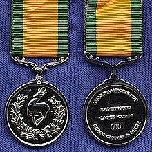 Proof specimen with errors National Cadet Bisley Grand Champion Medal.jpg