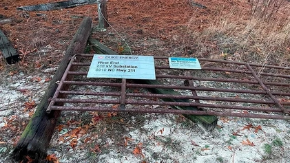 File:Damaged substation fence in Moore County.webp