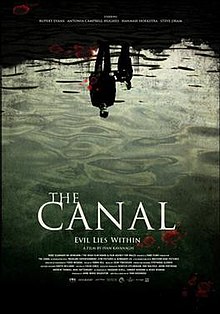 A film poster showing the reflection of man and a young boy in the water. At the bottom of the poster, the tag line says, "Evil lies within".