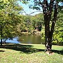 Thumbnail image of a fishing lake at Tomlinson Run State Park