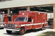 A typical Type I ambulance.  The front of the ambulance is the same as a pickup truck, while the patient-care compartment is in the box-like module.  At the time this photo was taken, this ambulance was operated by Palm Beach County Fire-Rescue in Palm Beach County, Florida.