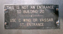 Plaque on the main entry door to Weiss' Lab in Wing F Not an entrance to building 20.png