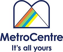 The logo used from 2004 to 2009; the stylised "M" is based on the previous grey-coloured symbol used from 1987 MetroCentre-Gateshead.jpg