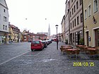 From in front of the Colosseum. On the left is the small open space where the memorial stone stands. (2008)