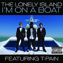 An image of Andy Samberg, Jorma Taccone, and T-Pain (in center with a top hat) standing on a yacht away from the shore.
