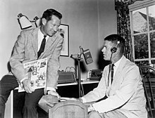 Jim Copp (right) in his home recording studio with Ed Brown, holding a copy of Jim Copp Tales