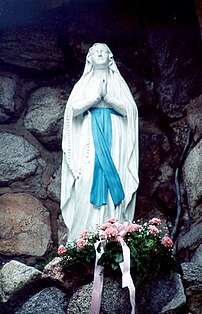 A statue of the Blessed Virgin Mary at the Gro...