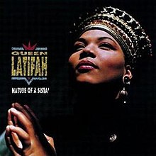 An image of Queen Latifah in an African-style headdress; the album title and her name are superimposed over the image