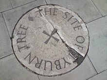 Stone marking the site of the Tyburn tree on the traffic island at the junction of Edgware Road, Bayswater Road and Oxford Street TyburnStone.jpg