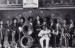 Fess Williams and his Royal Flush Orchestra – Fess can be seen at the front in a white suit