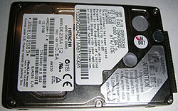 Hitachi 2.5 inch laptop hard drive. A hard drive is both storage equipment and a storage medium