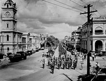 Parade of 31st Battalion, Kennedy Regiment, marching down Flinders Street, Townsville, Queensland, 1937 Townsville 1937 parade of 31st battalion kennedy regiment.jpg