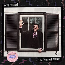 Will Wood reaches out and waves from an open window; the picture is surrounded by a black frame with colorful zig-zags scattered around and the album's name and author written in a serif font that has been wriggled around