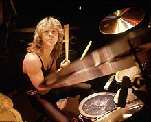 Clive Burr playing drums.jpg