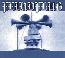 The album cover, showing a six-horned German air raid siren