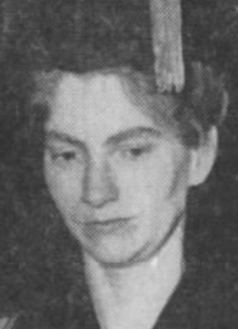 A young white woman wearing a mortarboard cap