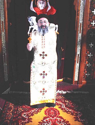 Reverend Father Philopater Mouris Wahba, the Priest of St Mary's and St Abu Saifain's Coptic Orthodox Church in the town of Risca, South Wales. Fr Philopater Wahba.jpg