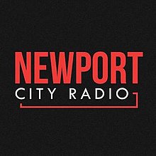 The logo for the Newport City Radio station, in all capital letters. The word Newport is large at the top in red, with city radio in a smaller white section below.