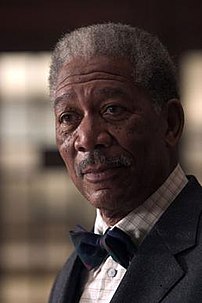Morgan Freeman as Lucius Fox from Batman Begins.