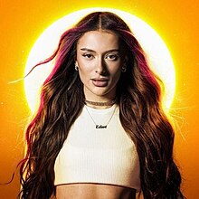 The cover artwork for "Hurricane". It features Eden Golan amongst a yellow background, with a sun behind Golan illuminating her.