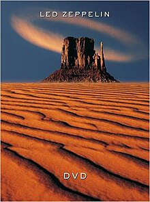 A desert with the words "LED ZEPPELIN / DVD" written in silver
