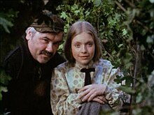 Ray Smith (1936–1991) as the blacksmith Willie Davidson with Judi Bowker as Vicky Gordon in the episode "The Horsemen" in the series "Adventures of Black Beauty".jpg