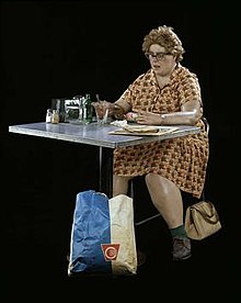 Duane Hanson, Woman Eating, polyester resin, fiberglass, polychromed in oil paint with clothes, table, chair and accessories, Smithsonian American Art Museum, 1971 Duane-Hanson-Sculpture-Woman-Eating-Synthetic-Material-1971.jpg