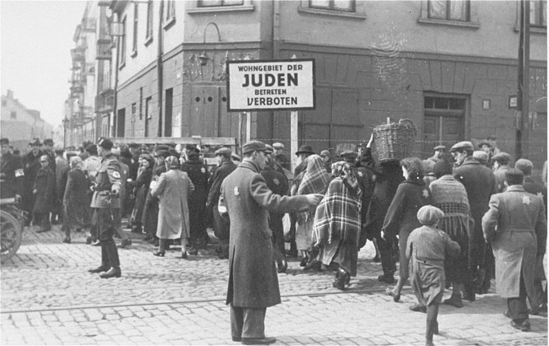 File:Directing pedestrian traffic in the Lodz ghetto.jpg