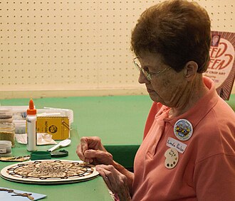 Linda Paulsen demonstrates making seed art at the Minnesota State Fair LindaPaulson.jpg