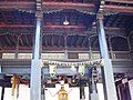 Wood structure supporting roof at Krishnapura