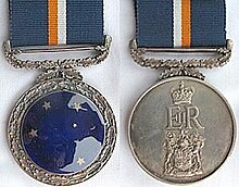 With the royal cypher Southern Cross Medal, 1952.jpg