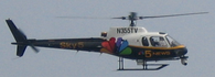 WMAQ's news helicopter, "Sky5" with the old gold 5 logo from July 2006. WMAQ-NBC5 Sky5 Chopper.png