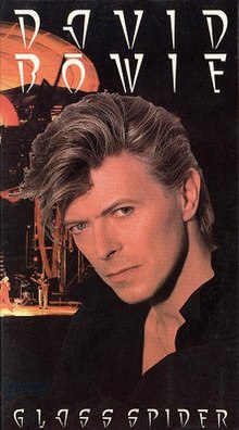 A picture showing a contemporary portrait David Bowie in front of a shot of the Glass Spider Tour's stage