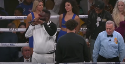 Rick Ross (left), S-X (centre) and Lil Baby (right) performing "Down Like That" at KSI vs. Logan Paul II on 9 November 2019 at the Staples Center in Los Angeles, United States. The trio performed the song standing inside the boxing ring, while KSI made his entrance and walked towards the ring.