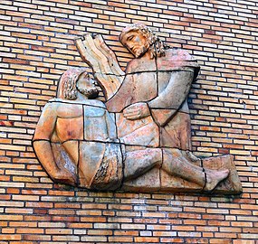 Laupias Samarialainen, 1954 on Meilahden kirkon seinässä.