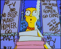 Marge katselemassa Homerin kirjoituksia