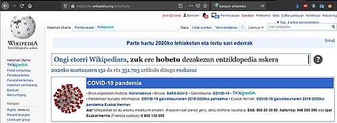 Tampilan muka euwiki (bahasa Basque di Spanyol) dengan kotak informasi covid-19