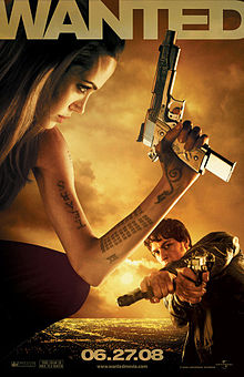 Movie poster with a woman on the left holding a large handgun as she faces right. Her left arm is covered in tattoos. A man on the right is facing forward and is holding two handguns, one hand held over the other. The top of the image includes the film's title, while the bottom shows an overhead view of a city's lights as well as the release date.