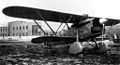 Aeroporto di Foligno. Un Fiat C.R.32 e sullo sfondo la palazzina comando