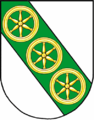 D'argento alla banda di verde, carica di tre ruote d'oro (Valdaora)