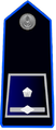 Distintivo di qualifica su controspallina di ispettore superiore del Corpo di polizia penitenziaria.