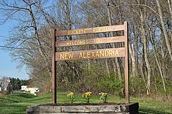 Welcome sign near west entrance of the village