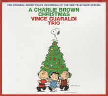 唱片封面為史努比、查理·布朗、露西·潘貝魯特、奈勒斯·潘貝魯特等《花生漫畫》角色在聖誕樹旁嬉戲。