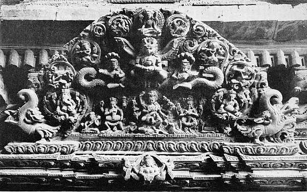 Black and white photograph of wood-carving over doorway at Katmandu.