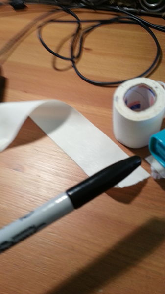 File:3. Wrapping the Tapes around the Markers.jpg