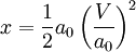{x}= frac {1}{2} {a}_0 left( {frac{V}{{a}_0}}right)^2