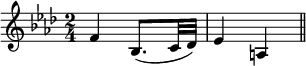 { \relative f' { \key f \minor \time 2/4
  f4 bes,8.( c32 des) | ees4 a, \bar "||" } }