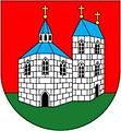 Sadská város címere, térben ábrázolt templom. Mivel stilizált, nem vét súlyosan a heraldika szabályai ellen.